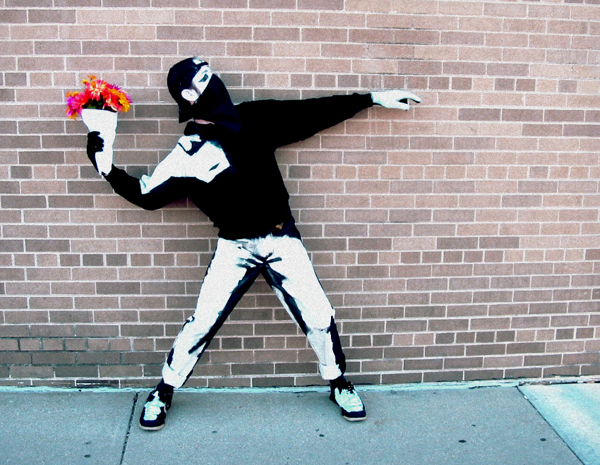 Jason McDowell (aka Little Tiny Fish) as Banksy's "Flower Bomber."